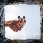 Disposal,Of,Batteries.,A,Man,Puts,Old,Used,Aa,Batteries