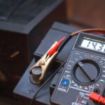 Checking,Voltage,With,Multimeter,And,Charging,Car,Battery,With,Charger