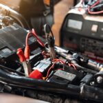 Charging,Motorcycle,Battery,At,Garage,,Selective,Focus,On,Alligator,Clip